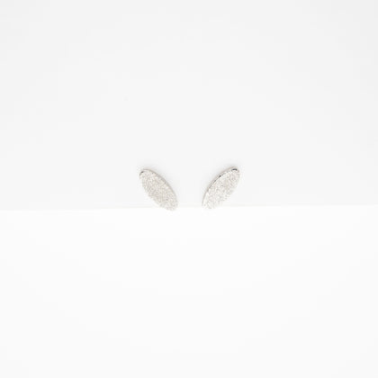 Aretes Ovalados Con Glitter Plateado