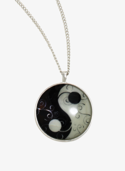 YIN-YANG GCOLLAR BRILLANTE EN LA OSCURIDAD