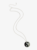 YIN-YANG GCOLLAR BRILLANTE EN LA OSCURIDAD